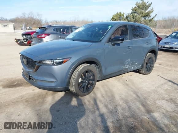 ✅ 2021 Mazda CX-5 Carbon Edition • VIN: JM3KFBCY4M0419731 • Лот: 41764840. Опубликован ранее на IAAI с пробегом 40 794 миль. Бесплатный доступ к архиву аукционных продаж из США и подробный отчёт об истории автомобиля на DreamBid. Изображение 2.