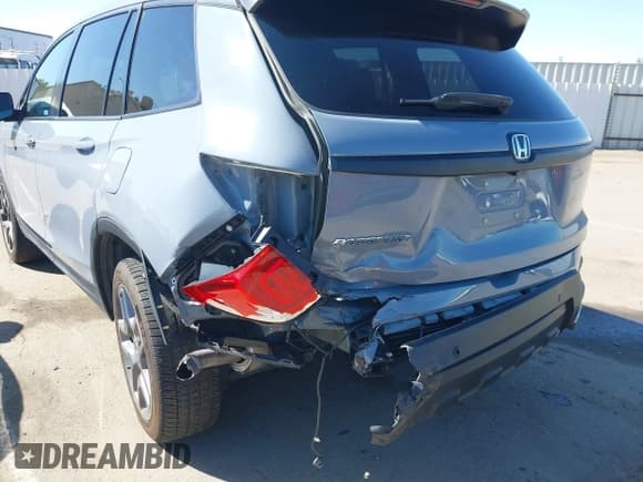 ✅ 2022 Honda Passport EX-L • VIN: 5FNYF7H52NB002772 • Lot: 42322827. Listed on IAAI with 55,798 mi. Free auction sales archive from the USA and detailed vehicle history report at DreamBid. Image 6.