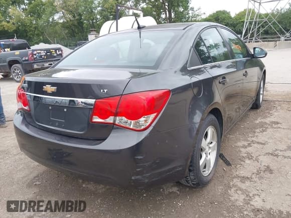 ✅ 2014 Chevrolet Cruze 1LT • VIN: 1G1PC5SB4E7195142 • Lot: 43022219. Listed on IAAI with 148,506 mi. Free auction sales archive from the USA and detailed vehicle history report at DreamBid. Image 4.