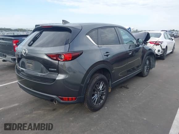 ✅ 2021 Mazda CX-5 Touring • VIN: JM3KFBCM7M0496218 • Lot: 43322405. Wystawiony na IAAI z przebiegiem 61 558 mil. Bezpłatny archiwum sprzedaży aukcyjnych z USA i szczegółowy raport historii pojazdu na DreamBid. Zdjęcie 4.