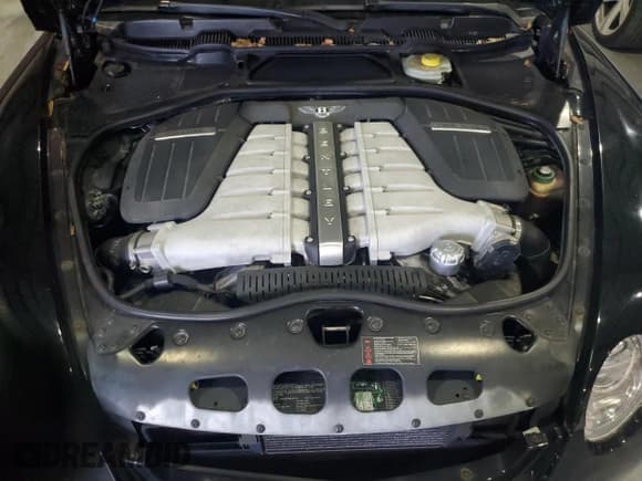 ✅ 2006 Bentley Continental GT GT • VIN: SCBCR63W56C033155 • Lot: 63028345. Wystawiony na Copart z przebiegiem 77 853 mil. Bezpłatny archiwum sprzedaży aukcyjnych z USA i szczegółowy raport historii pojazdu na DreamBid. Zdjęcie 11.