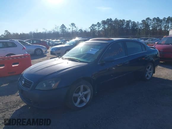 ✅ 2006 Nissan Altima SE • VIN: 1N4BL11D06N357882 • Lot: 43805604. Listed on IAAI with 270,614 mi. Free auction sales archive from the USA and detailed vehicle history report at DreamBid. Image 2.