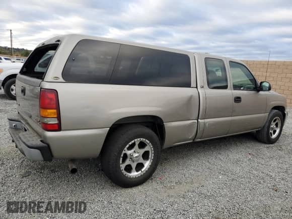 2001 GMC Sierra 1500 SLE1 with VIN 1GTEC19V41Z321666, listed as a Copart auction lot 82470244 with 220,830 mi miles and Clean title. Bid and sale history available at DreamBid. Image 3.