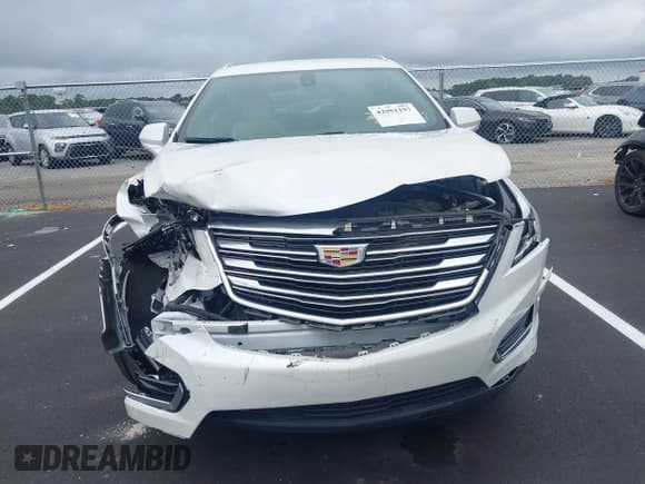 ✅ 2017 Cadillac XT5 FWD • VIN: 1GYKNARS1HZ138586 • Лот: 42951197. Опубликован ранее на IAAI с пробегом 69 129 миль. Бесплатный доступ к архиву аукционных продаж из США и подробный отчёт об истории автомобиля на DreamBid. Изображение 12.