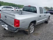 ✅ 2010 Dodge Dakota Bighorn/Lonestar • VIN: 1D7CW3GK4AS140049 • Lot: 42231805. Wystawiony na IAAI z przebiegiem 149 489 mil. Bezpłatny archiwum sprzedaży aukcyjnych z USA i szczegółowy raport historii pojazdu na DreamBid. Zdjęcie 4.