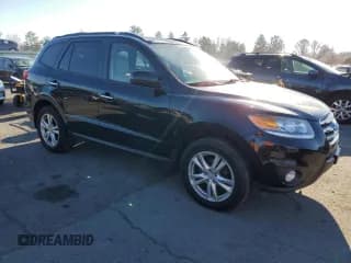 ✅ 2012 Hyundai Santa Fe Limited • VIN: 5XYZKDAG1CG159080 • Lot: 82495254. Listed on Copart with 174,813 mi. Free auction sales archive from the USA and detailed vehicle history report at DreamBid. Image 4.