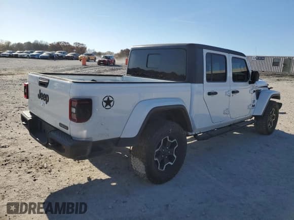 ✅ 2021 Jeep Gladiator Freedom • VIN: 1C6HJTAG8ML562950 • Lot: 91608665. Listed on Copart with 57,756 mi. Free auction sales archive from the USA and detailed vehicle history report at DreamBid. Image 3.