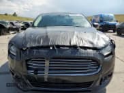 ✅ 2013 Ford Fusion Titanium Hybrid • VIN: 3FA6P0RU5DR367807 • Lot: 62542965. Listed on Copart with 177,134 mi. Free auction sales archive from the USA and detailed vehicle history report at DreamBid. Image 5.