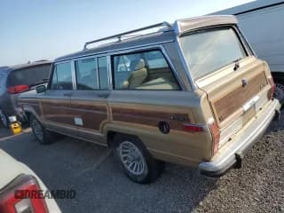 ✅ 1989 Jeep Grand Wagoneer • VIN: 1J4GS5875KP105984 • Lot: 75276954. Wystawiony na Copart z przebiegiem 161 960 mil. Bezpłatny archiwum sprzedaży aukcyjnych z USA i szczegółowy raport historii pojazdu na DreamBid. Zdjęcie 2.