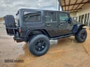 ✅ 2012 Jeep Wrangler Unlimited Sport • VIN: 1C4BJWDG2CL285982 • Lot: 94131105. Listed on Copart with 108,494 mi. Free auction sales archive from the USA and detailed vehicle history report at DreamBid. Image 3.