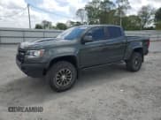 ✅ 2018 Chevrolet Colorado 4WD ZR2 • VIN: 1GCPTEE11J1194070 • Lot: 52037025. Listed on Copart with 104,858 mi. Free auction sales archive from the USA and detailed vehicle history report at DreamBid. Image 1.