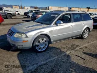 ✅ 2005 Volkswagen Passat GLS • VIN: WVWCD63B05E135281 • Lot: 96024095. Listed on Copart with 129,956 mi. Free auction sales archive from the USA and detailed vehicle history report at DreamBid. Image 1.