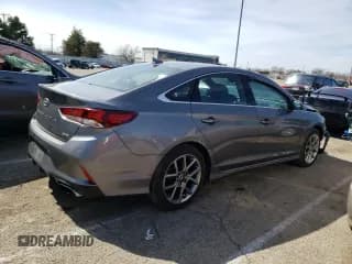 ✅ 2018 Hyundai Sonata Limited Plus • VIN: 5NPE34AB7JH667785 • Лот: 43824853. Опубликован ранее на Copart с пробегом 65 099 миль. Бесплатный доступ к архиву аукционных продаж из США и подробный отчёт об истории автомобиля на DreamBid. Изображение 3.