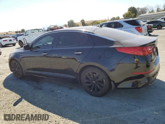 ✅ 2015 Kia Optima SX • VIN: 5XXGR4A72FG428697 • Лот: 81697405. Опубликован ранее на Copart с пробегом 70 454 миль. Бесплатный доступ к архиву аукционных продаж из США и подробный отчёт об истории автомобиля на DreamBid. Изображение 2.