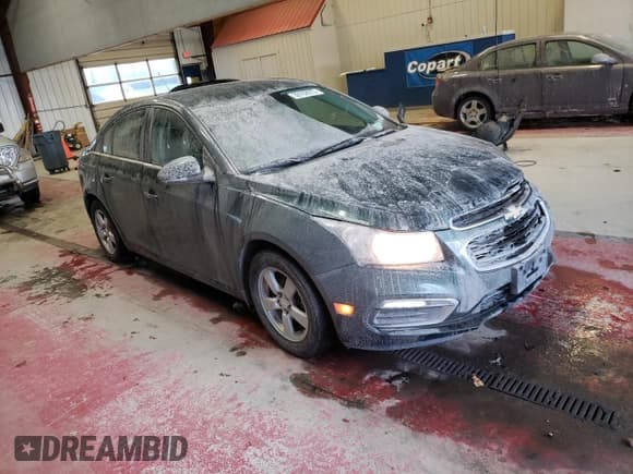 ✅ 2015 Chevrolet Cruze LT • VIN: 1G1PC5SB1F7186979 • Lot: 39162973. Listed on Copart with 130,583 mi. Free auction sales archive from the USA and detailed vehicle history report at DreamBid. Image 4.