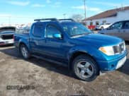 ✅ 2005 Nissan Frontier Nismo • VIN: 1N6AD07W15C408190 • Lot: 43790734. Listed on IAAI with 186,866 mi. Free auction sales archive from the USA and detailed vehicle history report at DreamBid. Image 1.