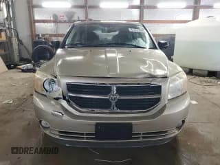 ✅ 2010 Dodge Caliber Mainstreet • VIN: 1B3CB3HAXAD627936 • Лот: 81231994. Опубликован ранее на Copart с пробегом 118 279 миль. Бесплатный доступ к архиву аукционных продаж из США и подробный отчёт об истории автомобиля на DreamBid. Изображение 5.