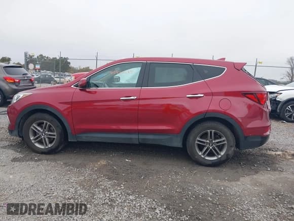 ✅ 2017 Hyundai Santa Fe 2.4L • VIN: 5XYZTDLB7HG403529 • Lot: 43428533. Listed on IAAI with 119,836 mi. Free auction sales archive from the USA and detailed vehicle history report at DreamBid. Image 15.