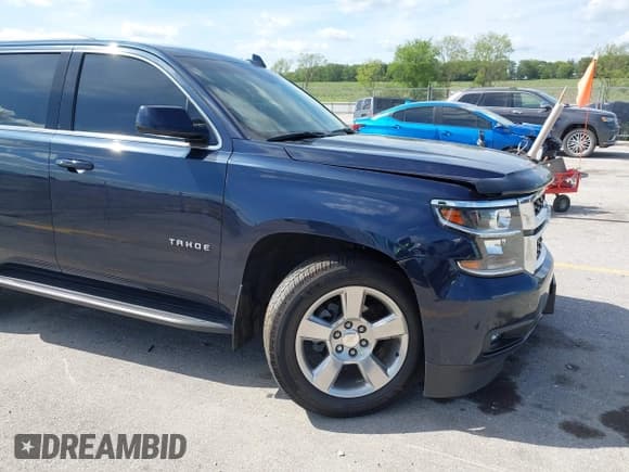 ✅ 2019 Chevrolet Tahoe LT • VIN: 1GNSKBKC8KR214892 • Lot: 42702156. Listed on IAAI with 60,779 mi. Free auction sales archive from the USA and detailed vehicle history report at DreamBid. Image 18.