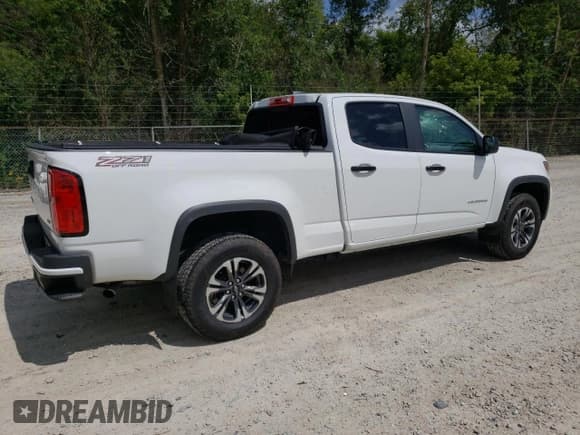 ✅ 2022 Chevrolet Colorado 4WD Z71 • VIN: 1GCGTDEN2N1280894 • Лот: 68010564. Опубликован ранее на Copart с пробегом 22 517 миль. Бесплатный доступ к архиву аукционных продаж из США и подробный отчёт об истории автомобиля на DreamBid. Изображение 3.