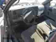 2000 Dodge Dakota z VIN 1B7FL26P6YS582901, wystawiony jako Copart lot #49786315 z przebiegiem 165 727 mil mil oraz Szkoda całkowita • Salvage title. Historia ofert i sprzedaży dostępna na DreamBid. Obrazek 8.