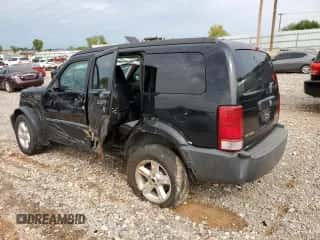 2007 Dodge Nitro SXT с VIN 1D8GU28K27W601732, выставлен на аукционе Copart как лот 72654904 с пробегом 123 249 миль миль и Списание • Salvage title. История ставок и продаж доступна на DreamBid. Изображение 2.