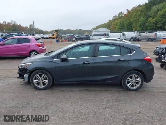 2018 Chevrolet Cruze LT with VIN 3G1BE6SM2JS574129, listed as a IAAI auction lot 43435357 with 114,058 mi miles and . Bid and sale history available at DreamBid. Image 14.