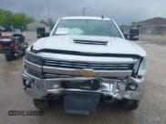 ✅ 2018 Chevrolet Silverado 2500HD LT • VIN: 1GC1KVEY8JF225582 • Lot: 42423640. Listed on IAAI with 160,666 mi. Free auction sales archive from the USA and detailed vehicle history report at DreamBid. Image 13.