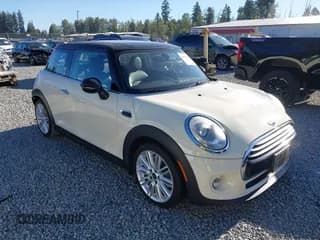 ✅ 2015 MINI Hardtop • VIN: WMWXM5C57F3B34129 • Lot: 43056474. Listed on IAAI with 55,469 mi. Free auction sales archive from the USA and detailed vehicle history report at DreamBid. Image 1.