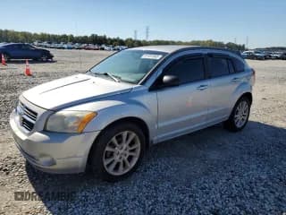 ✅ 2011 Dodge Caliber Heat • VIN: 1B3CB5HA5BD211449 • Lot: 91161865. Listed on Copart with 198,976 mi. Free auction sales archive from the USA and detailed vehicle history report at DreamBid. Image 1.