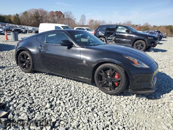 ✅ 2012 Nissan 370Z • VIN: JN1AZ4EHXCM564142 • Lot: 93467265. Listed on Copart with 103,036 mi. Free auction sales archive from the USA and detailed vehicle history report at DreamBid. Image 4.