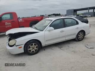 2000 Hyundai Sonata GLS with VIN KMHWF35V0YA347621, listed as a Copart auction lot 76346874 with 164,489 mi miles and Salvage title. Bid and sale history available at DreamBid. Image 1.