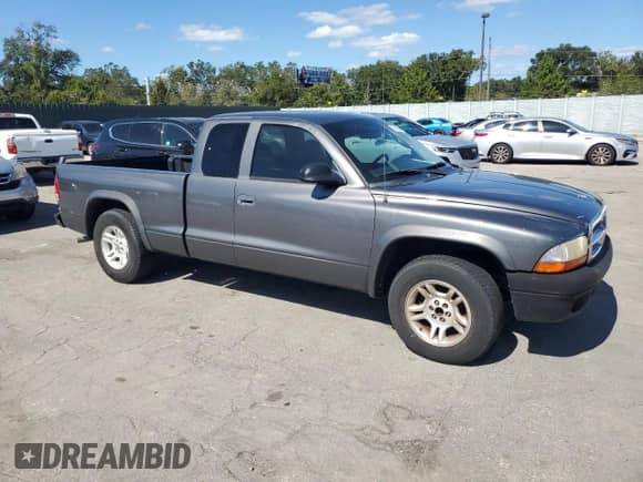 2004 Dodge Dakota z VIN 1D7GL12K64S603027, wystawiony jako Copart lot #75915894 z przebiegiem Nie podano mil oraz Czysty tytuł • Clean title. Historia ofert i sprzedaży dostępna na DreamBid. Obrazek 4.