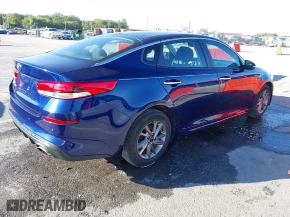 ✅ 2019 Kia Optima S • VIN: 5XXGT4L31KG321582 • Lot: 43421552. Listed on IAAI with 106,359 mi. Free auction sales archive from the USA and detailed vehicle history report at DreamBid. Image 4.