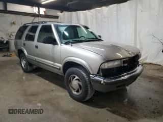 2000 Chevrolet Blazer LT z VIN 1GNDT13WXY2353612, wystawiony jako Copart lot #82120334 z przebiegiem 147 410 mil mil oraz Szkoda całkowita • Salvage title. Historia ofert i sprzedaży dostępna na DreamBid. Obrazek 4.