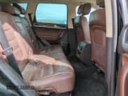 ✅ 2013 Volkswagen Touareg Exec • VIN: WVGEF9BP3DD001656 • Lot: 49436605. Listed on Copart with 186,277 mi. Free auction sales archive from the USA and detailed vehicle history report at DreamBid. Image 10.