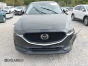 ✅ 2020 Mazda CX-5 Grand Touring • VIN: JM3KFBDM9L0780575 • Lot: 43452456. Listed on IAAI with 50,844 mi. Free auction sales archive from the USA and detailed vehicle history report at DreamBid. Image 6.
