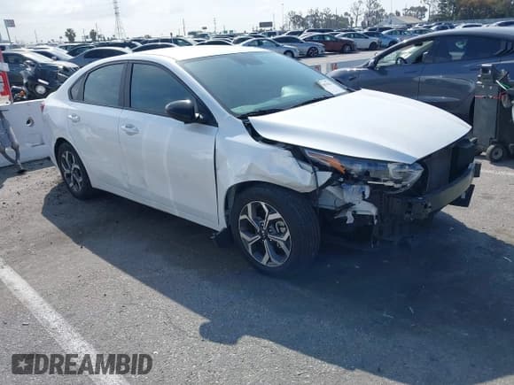 ✅ 2021 Kia Forte LXS • VIN: 3KPF24AD3ME299221 • Lot: 41893062. Listed on IAAI with 62,961 mi. Free auction sales archive from the USA and detailed vehicle history report at DreamBid. Image 1.