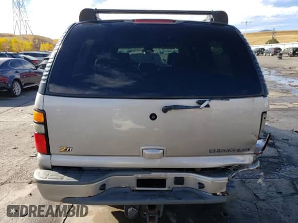 2004 Chevrolet Suburban Z71 z VIN 3GNFK16Z64G203614, wystawiony jako Copart lot #77475454 z przebiegiem 283 333 mil mil oraz Szkoda całkowita • Salvage title. Historia ofert i sprzedaży dostępna na DreamBid. Obrazek 6.