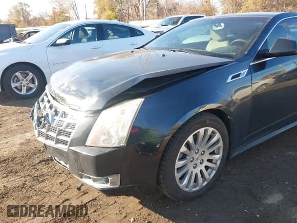 ✅ 2014 Cadillac CTS Performance • VIN: 1G6DG1E35E0169673 • Lot: 43698420. Listed on IAAI with 84,034 mi. Free auction sales archive from the USA and detailed vehicle history report at DreamBid. Image 6.