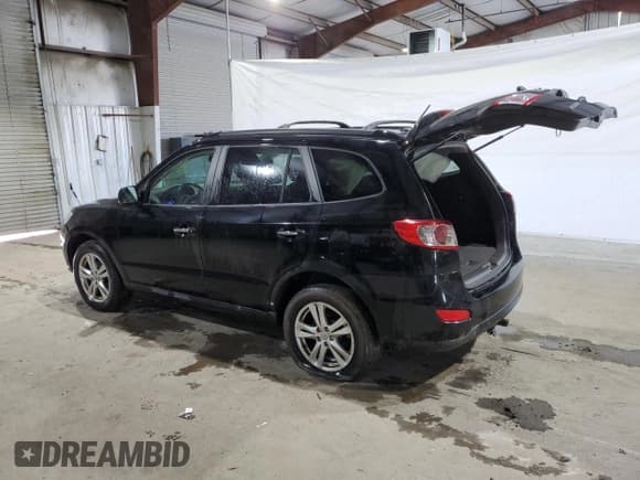 ✅ 2011 Hyundai Santa Fe Limited • VIN: 5XYZKDAGXBG073250 • Lot: 40988594. Listed on Copart with 87,148 mi. Free auction sales archive from the USA and detailed vehicle history report at DreamBid. Image 2.