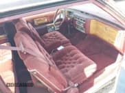 ✅ 1984 Cadillac Fleetwood • VIN: 1G6AW4782E9141227 • Лот: 42595056. Опубликован ранее на IAAI с пробегом 73 517 миль. Бесплатный доступ к архиву аукционных продаж из США и подробный отчёт об истории автомобиля на DreamBid. Изображение 5.