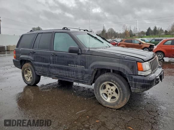 ✅ 1996 Jeep Grand Cherokee Laredo • VIN: 1J4GZ58SXTC221089 • Lot: 95514735. Listed on Copart with 235,324 mi. Free auction sales archive from the USA and detailed vehicle history report at DreamBid. Image 4.