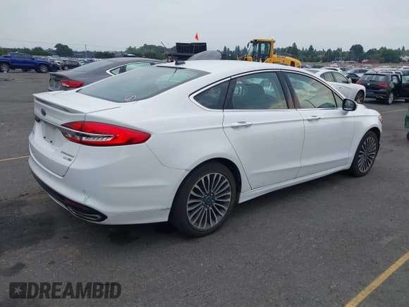 ✅ 2018 Ford Fusion Titanium • VIN: 3FA6P0D90JR234225 • Lot: 43134139. Listed on IAAI with 92,932 mi. Free auction sales archive from the USA and detailed vehicle history report at DreamBid. Image 4.