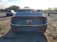 ✅ 2023 Kia EV6 Wind • VIN: KNDC34LA5P5130370 • Lot: 89710015. Wystawiony na Copart z przebiegiem 27 362 mil. Bezpłatny archiwum sprzedaży aukcyjnych z USA i szczegółowy raport historii pojazdu na DreamBid. Zdjęcie 6.