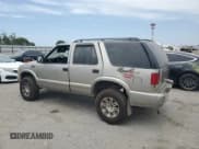 ✅ 2002 Chevrolet Blazer LS • VIN: 1GNDT13W52K153132 • Lot: 59196505. Wystawiony na Copart z przebiegiem 180 251 mil. Bezpłatny archiwum sprzedaży aukcyjnych z USA i szczegółowy raport historii pojazdu na DreamBid. Zdjęcie 2.