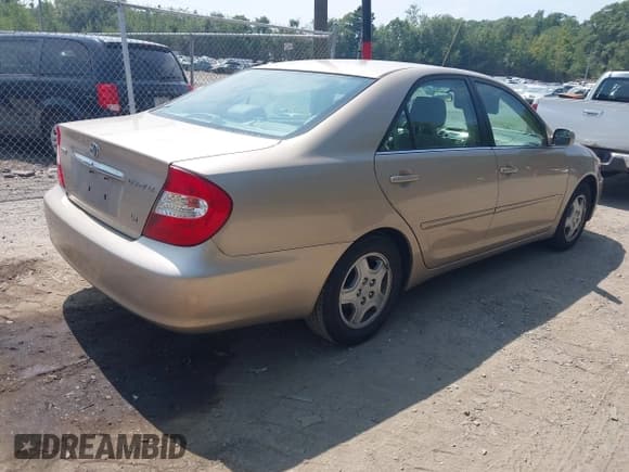✅ 2002 Toyota Camry XLE • VIN: 4T1BF32K02U009876 • Лот: 42973486. Опубликован ранее на IAAI с пробегом 138 303 миль. Бесплатный доступ к архиву аукционных продаж из США и подробный отчёт об истории автомобиля на DreamBid. Изображение 4.