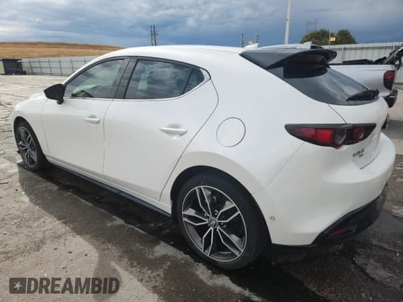 ✅ 2021 Mazda 3 Premium Plus • VIN: JM1BPBNY1M1334729 • Лот: 83754925. Опубликован ранее на Copart с пробегом 60 196 миль. Бесплатный доступ к архиву аукционных продаж из США и подробный отчёт об истории автомобиля на DreamBid. Изображение 2.