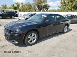 2022 Dodge Charger SXT with VIN 2C3CDXBG1NH239259, listed as a Copart auction lot 71926805 with 56,129 mi miles and Salvage title. Bid and sale history available at DreamBid. Image 1.