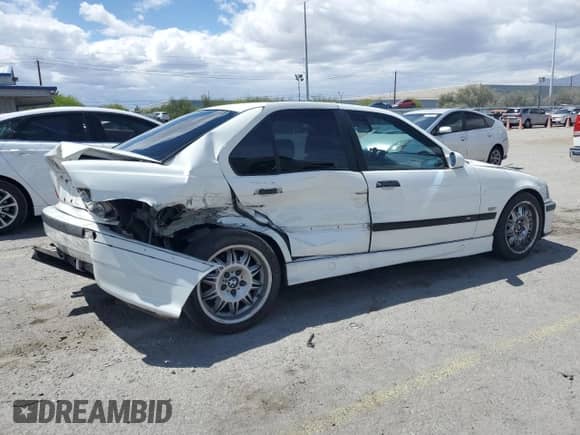 1997 BMW 3 Series M3s z VIN WBSCD9326VEE06423, wystawiony jako Copart lot #54953975 z przebiegiem 193 185 mil mil oraz Szkoda całkowita • Salvage title. Historia ofert i sprzedaży dostępna na DreamBid. Obrazek 3.